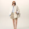 Giacca imbottita in nylon bianco con bottoni Giacca imbottita in nylon bianco con bottoni
