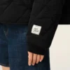 Giacca imbottita in nylon nero Giacca imbottita in nylon nero
