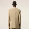 Giacca squadrata monopetto in lana vergine beige Giacca squadrata monopetto in lana vergine beige