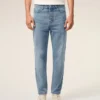 Jeans blu in cotone a vestibilità affusolata Jeans blu in cotone a vestibilità affusolata