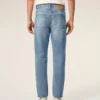 Jeans blu in cotone a vestibilità affusolata Jeans blu in cotone a vestibilità affusolata