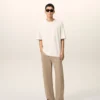 Jeans larghi in cotone beige Jeans larghi in cotone beige
