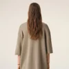 Maglia a maniche corte in lana beige con scollo a V Maglia a maniche corte in lana beige con scollo a V