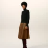 Maglia Ami de Coeur con collo alto in lana nera Maglia Ami de Coeur con collo alto in lana nera