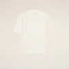 Maglia bianca in lana a maniche corte con scollo a V Maglia bianca in lana a maniche corte con scollo a V