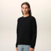 Maglione a girocollo in lana nera con Ami de Coeur a contrasto