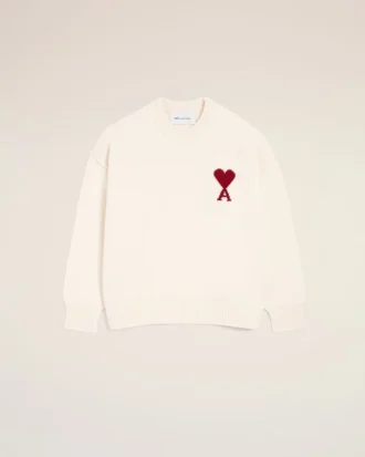 Maglione girocollo in lana naturale con Ami de Coeur a contrasto
