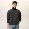 Maglione grigio in lana con collo a imbuto e Ami de Coeur a contrasto Maglione grigio in lana con collo a imbuto e Ami de Coeur a contrasto