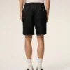 Pantaloncini Ami de Coeur in nylon nero con elastico in vita e borchie Pantaloncini Ami de Coeur in nylon nero con elastico in vita e borchie