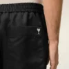 Pantaloncini Ami de Coeur in nylon nero con elastico in vita e borchie Pantaloncini Ami de Coeur in nylon nero con elastico in vita e borchie