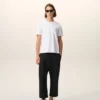Pantaloni a carota oversize in cotone nero Pantaloni a carota oversize in cotone nero