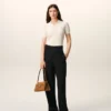 Pantaloni avvolgenti con cintura in lana vergine nera