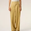 Pantaloni avvolgenti in lana vergine gialla con cintura