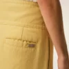 Pantaloni avvolgenti in lana vergine gialla con cintura