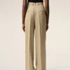 Pantaloni beige in lana vergine a vita alta e gamba larga