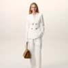 Pantaloni bianchi in misto lino con elastico in vita