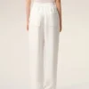 Pantaloni bianchi in misto lino con elastico in vita