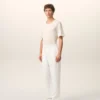 Pantaloni bianchi in misto lino con elastico in vita Pantaloni bianchi in misto lino con elastico in vita