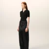 Pantaloni con cintura in raso nero e fibbia