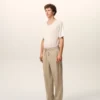 Pantaloni in cotone beige con elastico in vita Pantaloni in cotone beige con elastico in vita