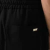 Pantaloni in lana vergine nera con elastico in vita