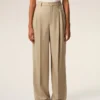 Pantaloni larghi a vita alta in lana vergine beige con due pieghe