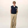 Pantaloni larghi a vita bassa in lana vergine beige