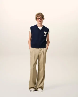 Pantaloni larghi a vita bassa in lana vergine beige
