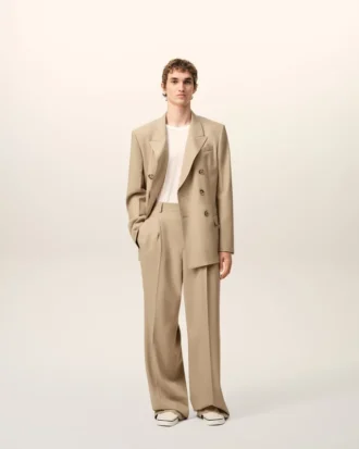 Pantaloni larghi a vita bassa in lana vergine beige