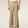 Pantaloni larghi a vita bassa in lana vergine beige