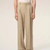 Pantaloni larghi a vita bassa in lana vergine beige