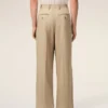 Pantaloni larghi a vita bassa in lana vergine beige