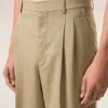 Pantaloni larghi a vita bassa in lana vergine beige