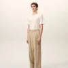 Pantaloni larghi a vita bassa in lana vergine beige