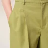 Pantaloni larghi a vita bassa in lana vergine verde