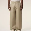 Pantaloni larghi in cotone beige Pantaloni larghi in cotone beige