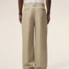 Pantaloni larghi in cotone beige Pantaloni larghi in cotone beige