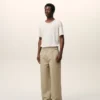 Pantaloni larghi in cotone beige Pantaloni larghi in cotone beige