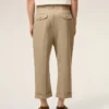 Pantaloni oversize a carota in cotone beige Pantaloni oversize a carota in cotone beige