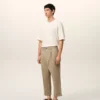 Pantaloni oversize a carota in cotone beige Pantaloni oversize a carota in cotone beige