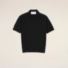 Polo a maniche corte in maglia nera Polo a maniche corte in maglia nera