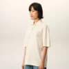 Polo con toppa in maglia di cotone bianco Ami de Coeur