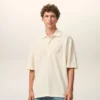 Polo con toppa in maglia di cotone bianco Ami de Coeur