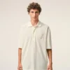 Polo con toppa in maglia di cotone bianco Ami de Coeur