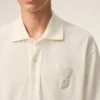 Polo con toppa in maglia di cotone bianco Ami de Coeur