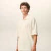 Polo con toppa in maglia di cotone bianco Ami de Coeur