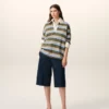 Polo in cotone con patch Ami a righe blu