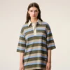 Polo in cotone con patch Ami a righe blu