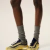 Sneakers Mirage in maglia gialla Sneakers Mirage in maglia gialla