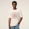 T-shirt Ami Paris in cotone bianco con stampa Heritage